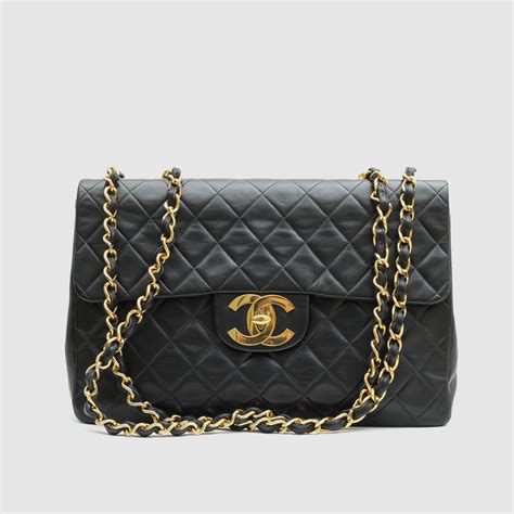 black quilted chanel bag price|Chanel black classic quilted handbag.